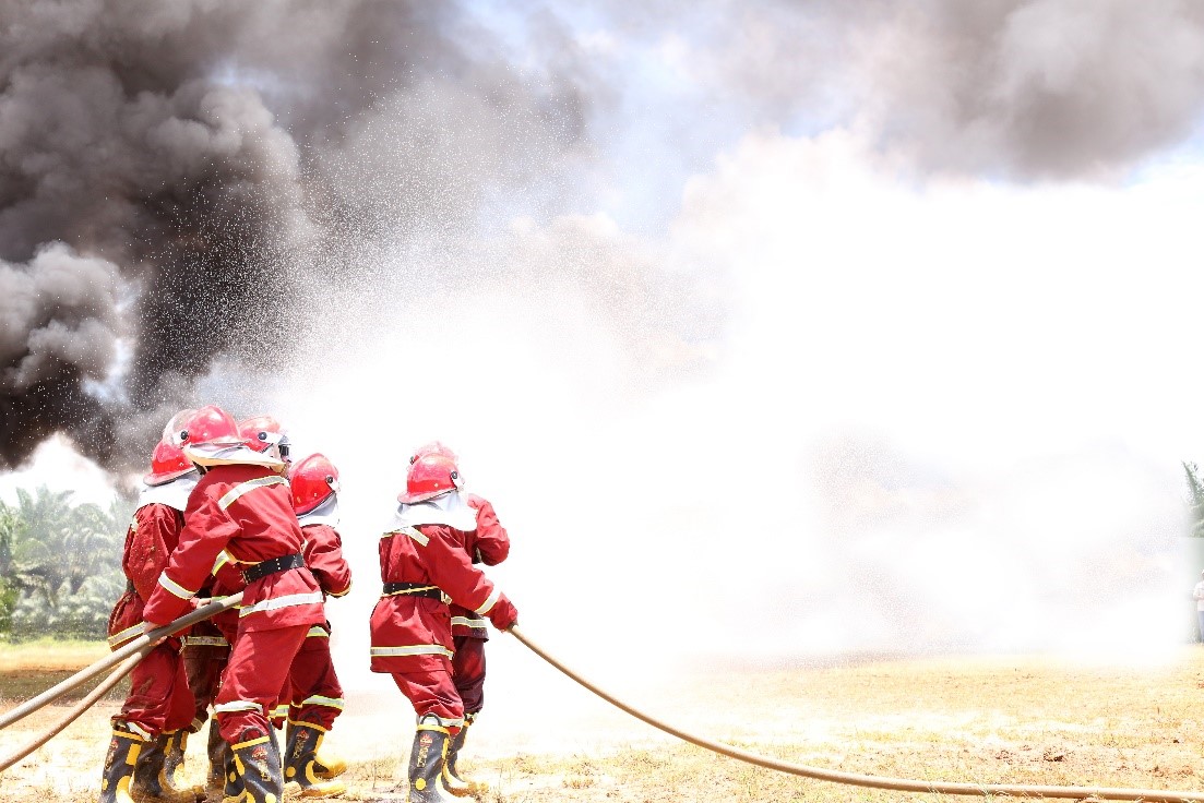 Villagers talking part in fire suppression training