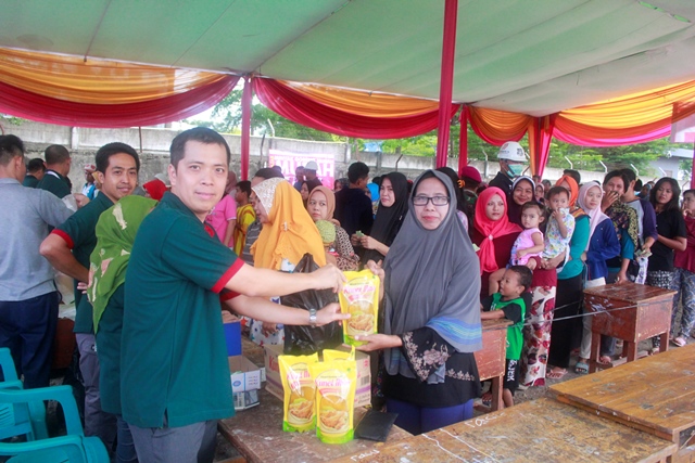 Together, sharing with love – community work in Tarahan
